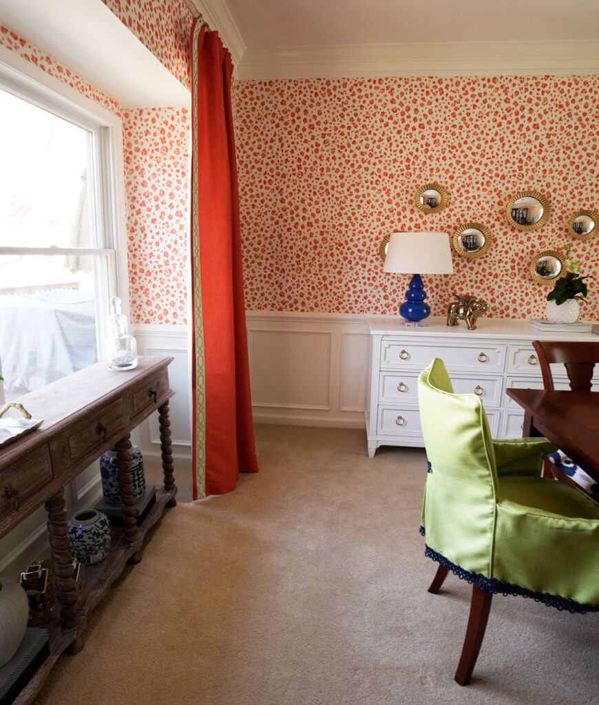 Dining room design featuring animal print wallpaper