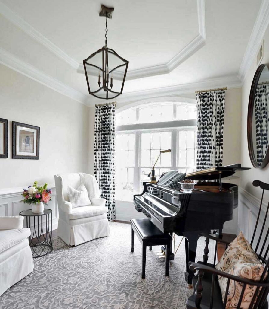 living room design featuring bold window treatments that update a piano room