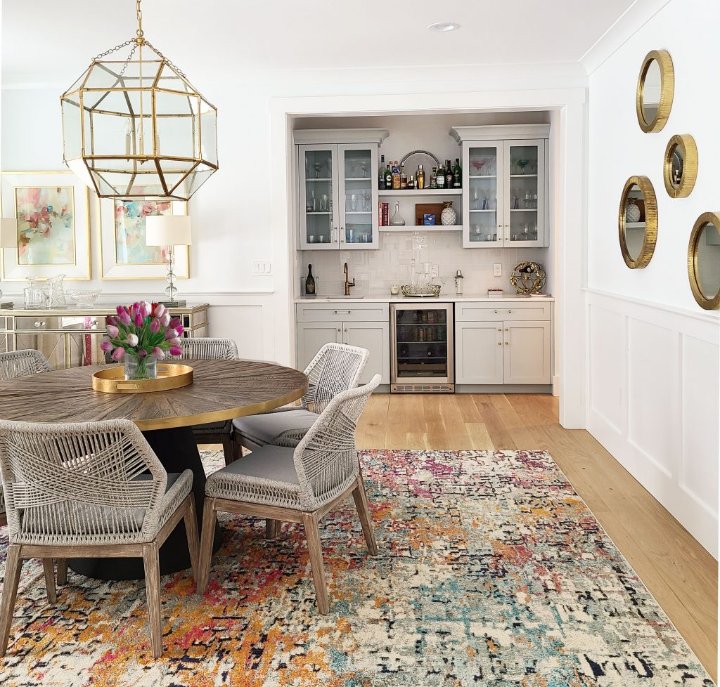 dining room design, main line pa, colorful rug, custom art work, decor