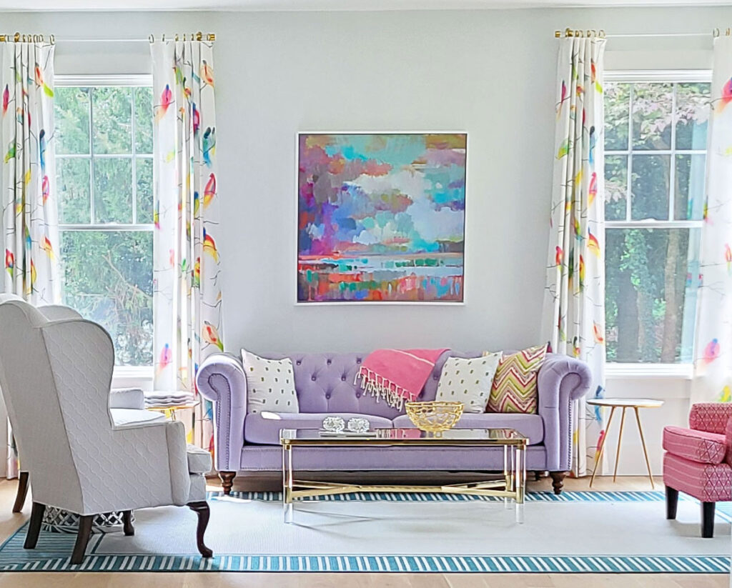 Main Line Interior designer incoporates furnishings into vibrant living room design