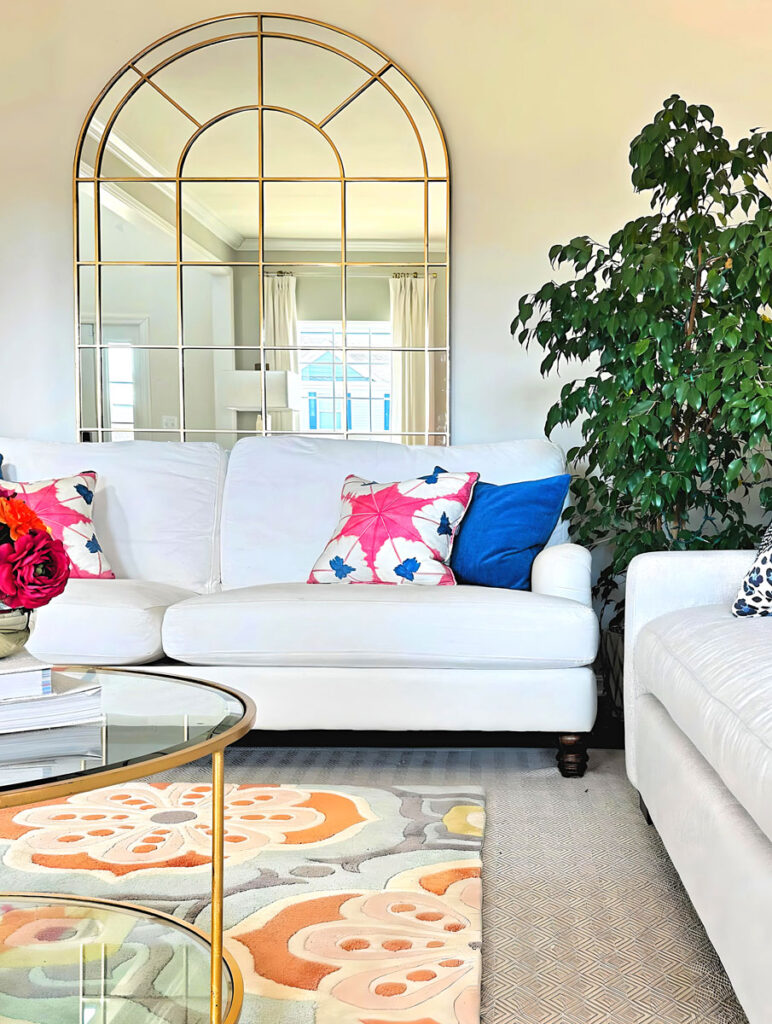 Living room design featuring large mirror