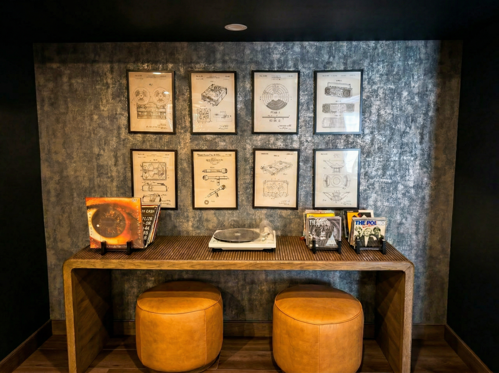 Retro inspired basement nook featuring vinyl records and vintage d&eacute;cor