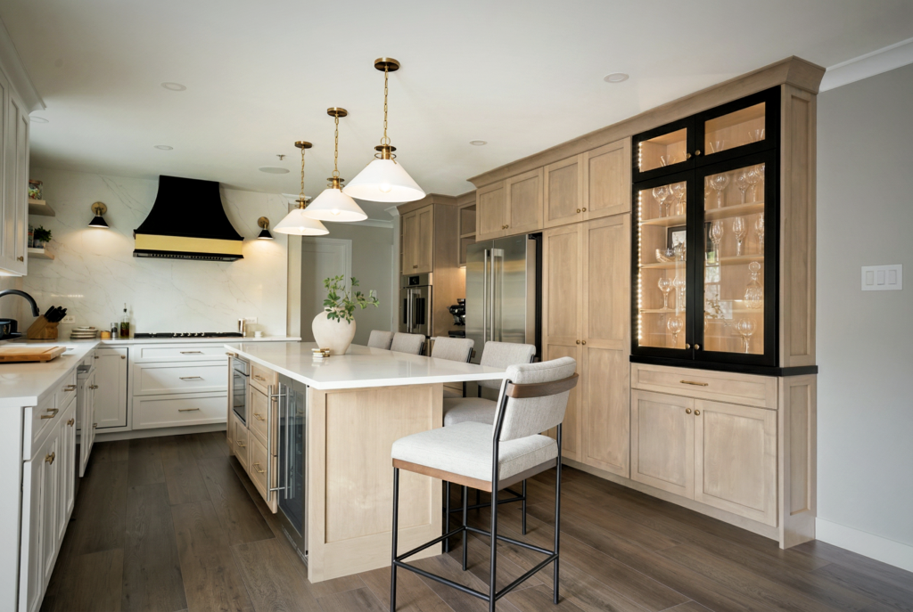 Large kitchen island with quartz countertop and seating designed for casual dining.